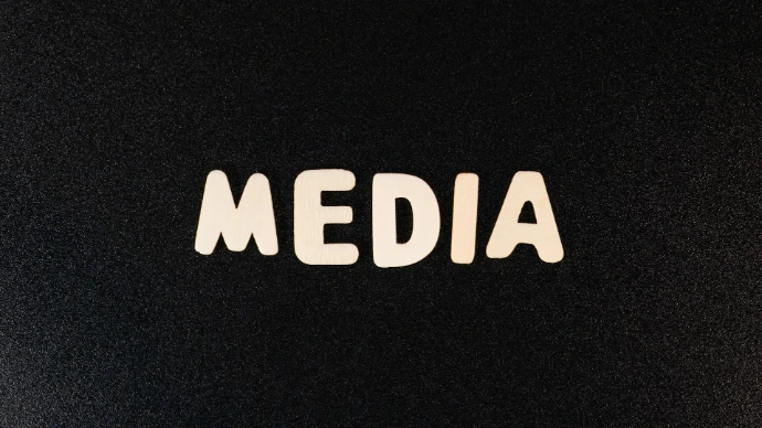 the word media spelled with white letters on a black background